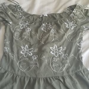 Green. Floral shirt.